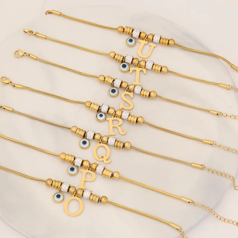 Pulsera Initial Charm – Personalizada en Oro